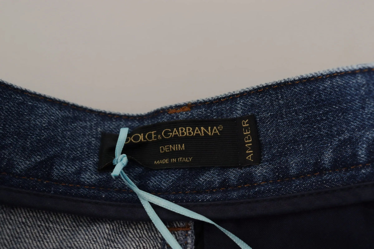 Waistband en denim bleu foncé avec étiquette noire dolce & gabbana en texte doré et détail amber sur le côté