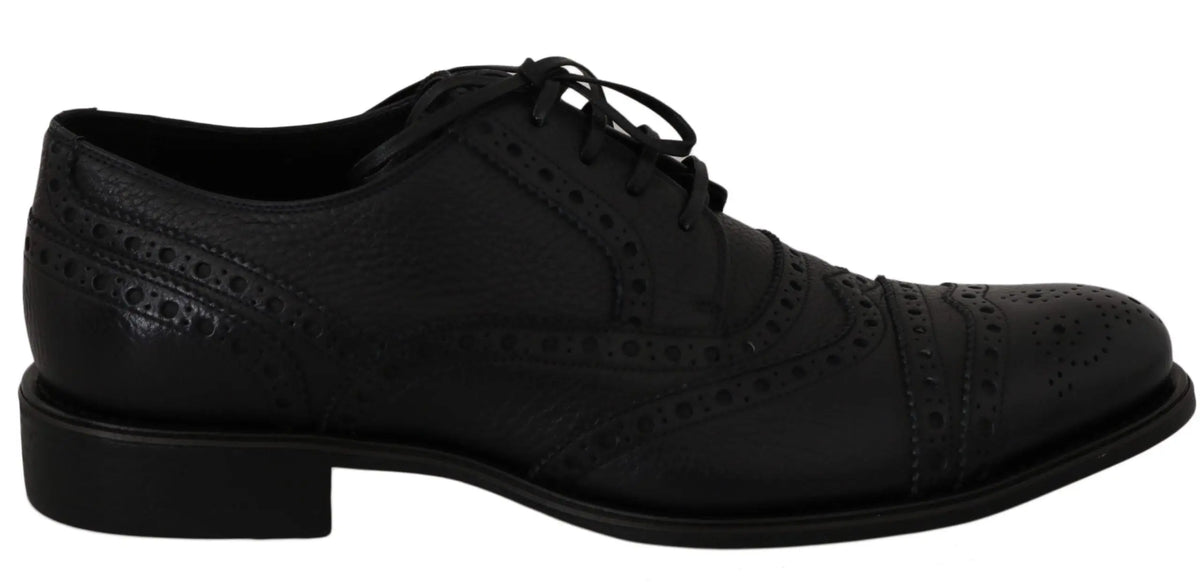 Chaussure derby bleu en cuir dolce & gabbana avec détails perforés et talon bas pour homme