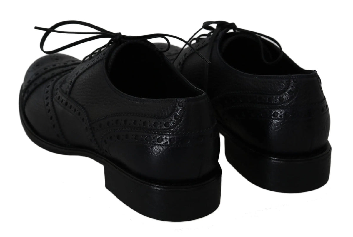 Dolce & gabbana blue leather wingtip oxford dress shoes in black leather with brogue perforated detailing and laces