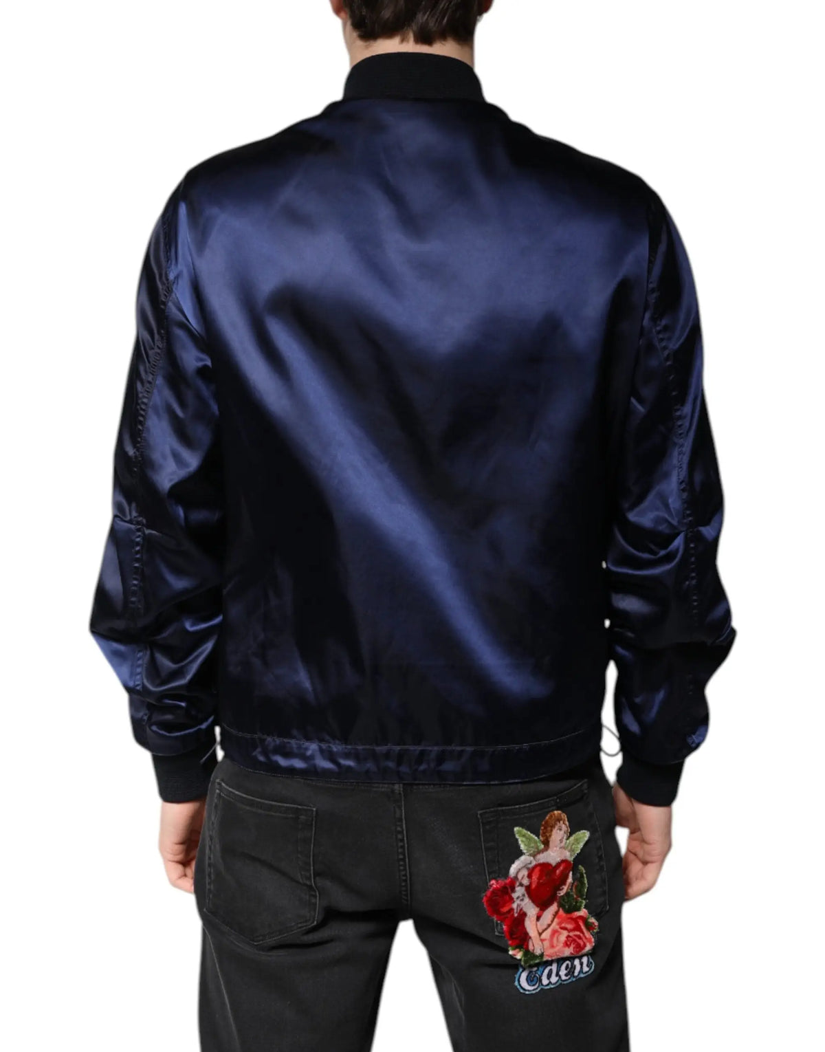 Dos de bomber en satin bleu marine dolce & gabbana avec broderie ange rouge et or sur la poche arrière