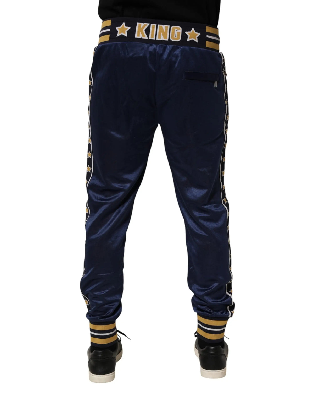 Dolce & gabbana pantalon jogging en nylon bleu marine avec détails étoiles et bandes dorées satinées au niveau de la taille et des jambes