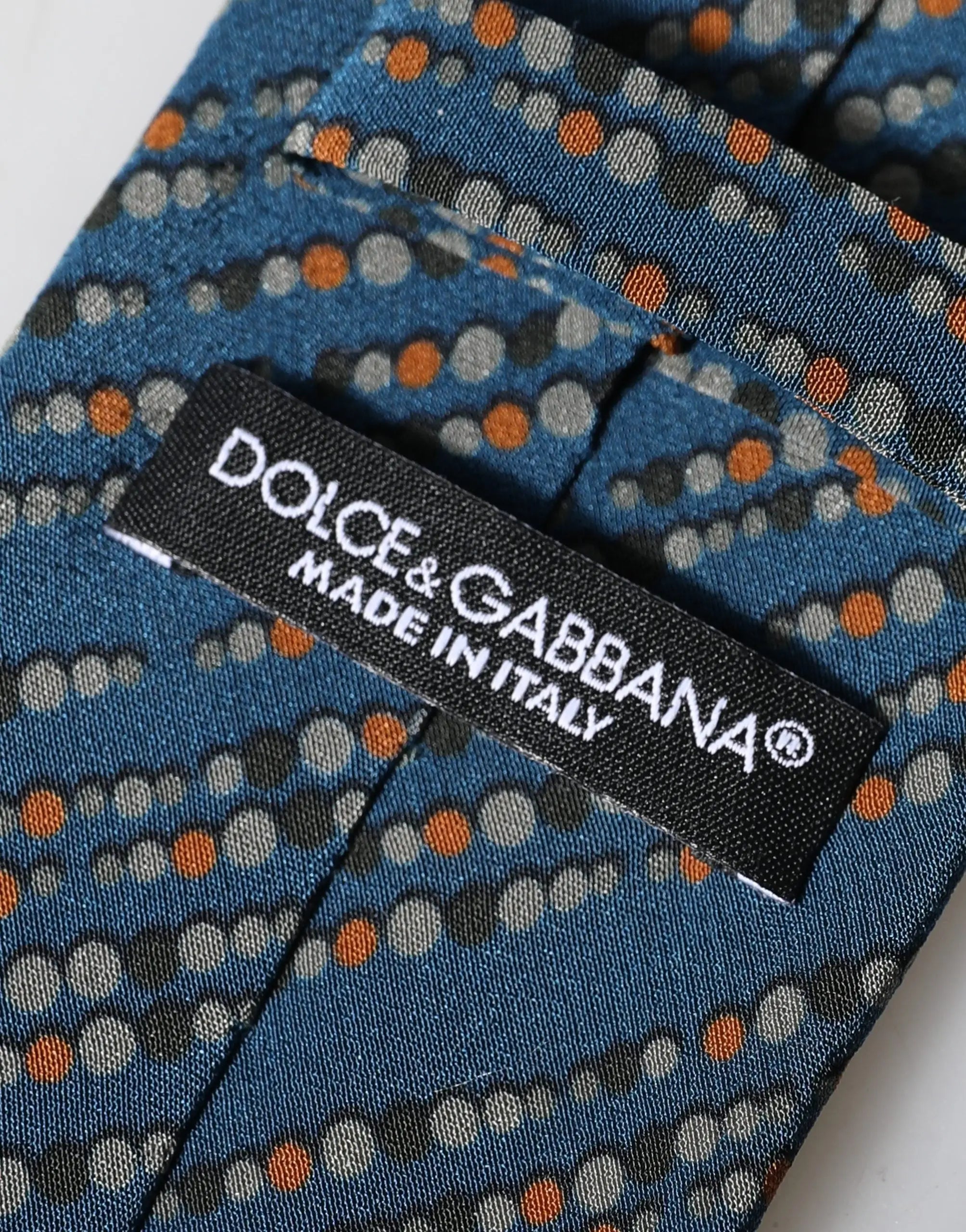 Dolce & Gabbana cravate homme bleue en soie 100 avec motif de points orange gris et noir ajustable