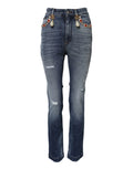 Jean en denim bleu Dolce & Gabbana avec chaînes dorées décoratives, strass rouges et pendentifs perle aux poches avant