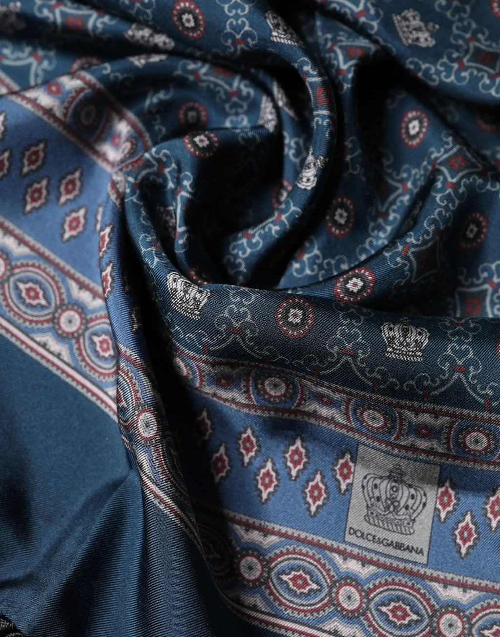 Navy blue dolce gabbana silk scarf with intricate red white and gold crowns and geometric motifs 184cm x 33cm