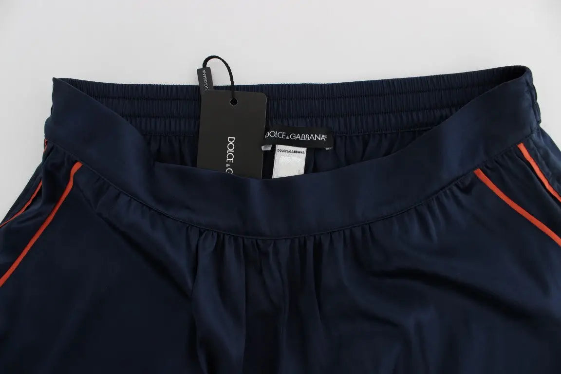 Short de nuit dolce & gabbana bleu en soie stretch avec piping orange sur les côtés pour un confort sportif