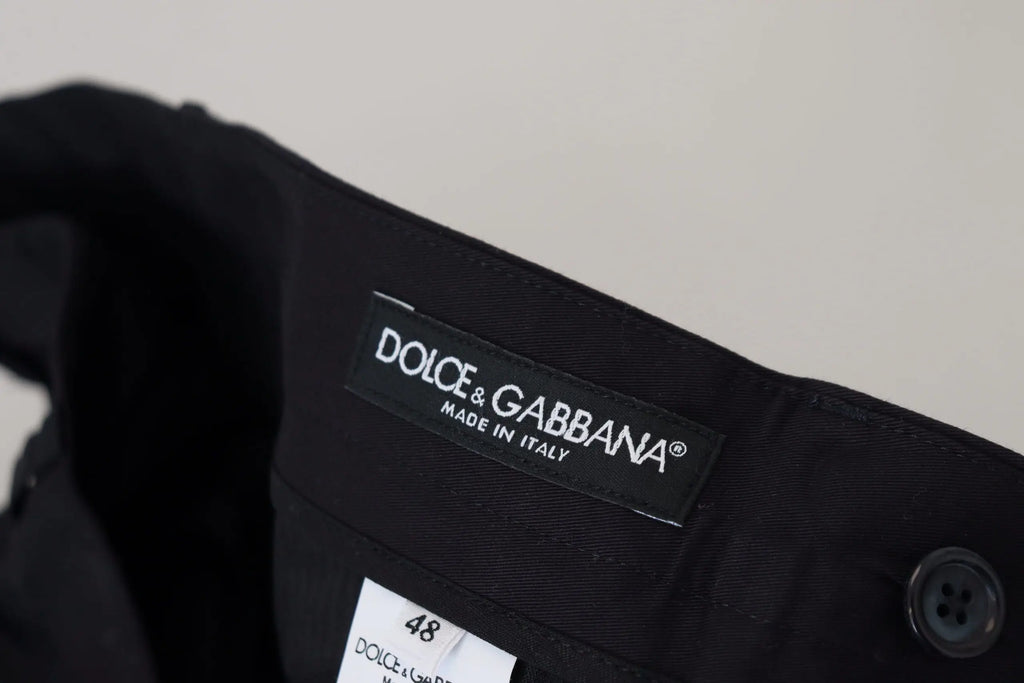 Étiquette noire dolce & gabbana indiquant made in italy taille 48 sur un pantalon chino bleu en coton stretch slim