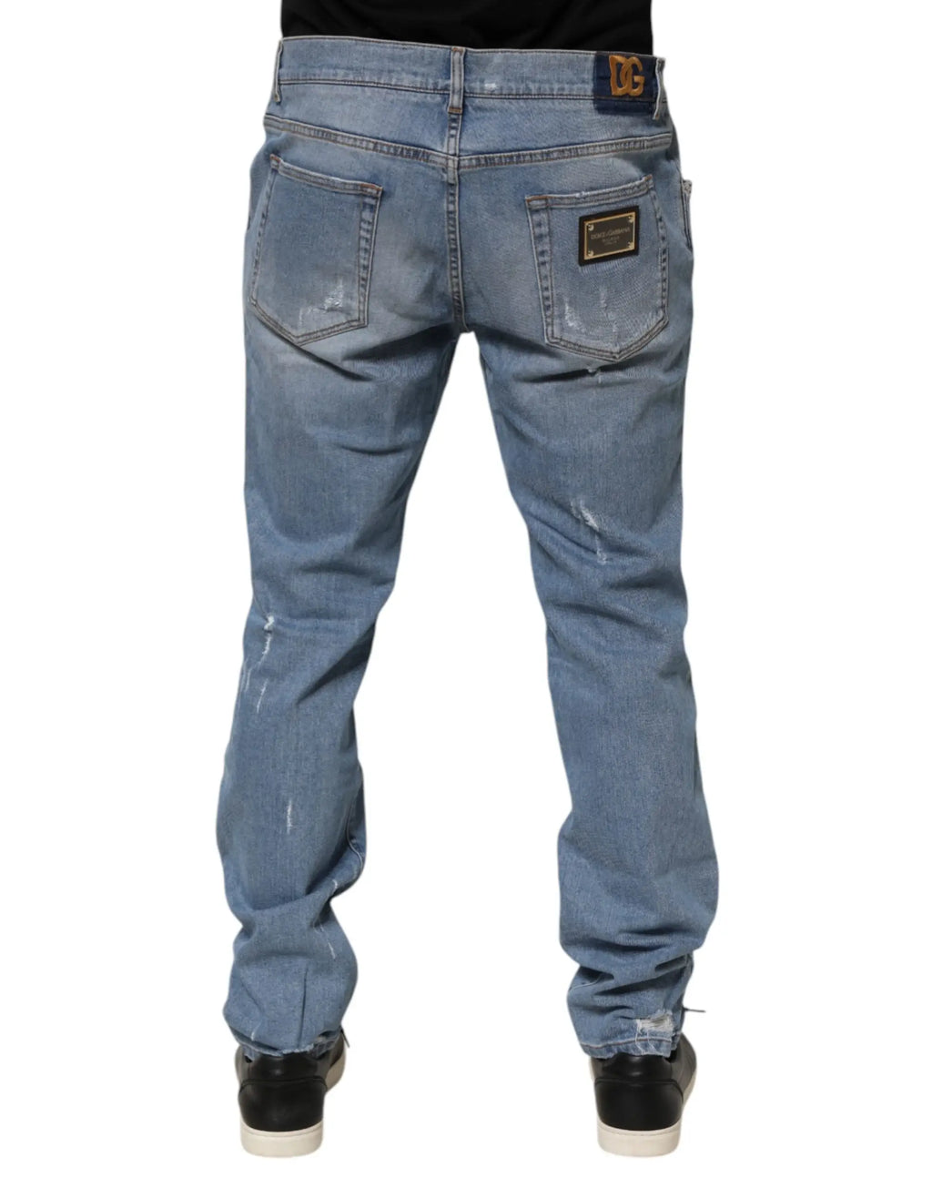 Jeans slim fit en denim de coton bleu clair dolce gabbana avec aspect usé déchiré et ourlets effilochés