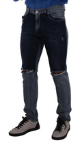 Jeans slim en denim bleu deux tons dolce gabbana en coton avec genoux déchirés et effet délavé