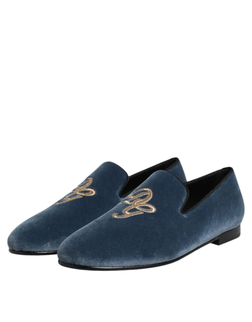 Deep blue velvet slip-on loafers with gold embroidered dg logo by Dolce & Gabbana for formal occasions