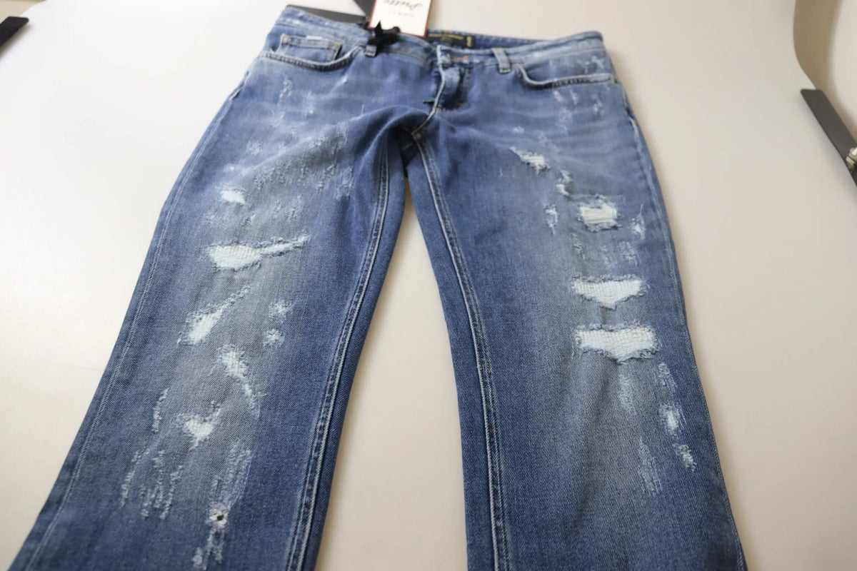 Jeans skinny taille basse en coton bleu délavé avec détails déchirés de Dolce & Gabbana