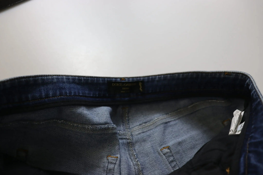 Jean skinny bleu lavé en coton de dolce et gabbana avec taille basse et étiquette de marque visible à la taille