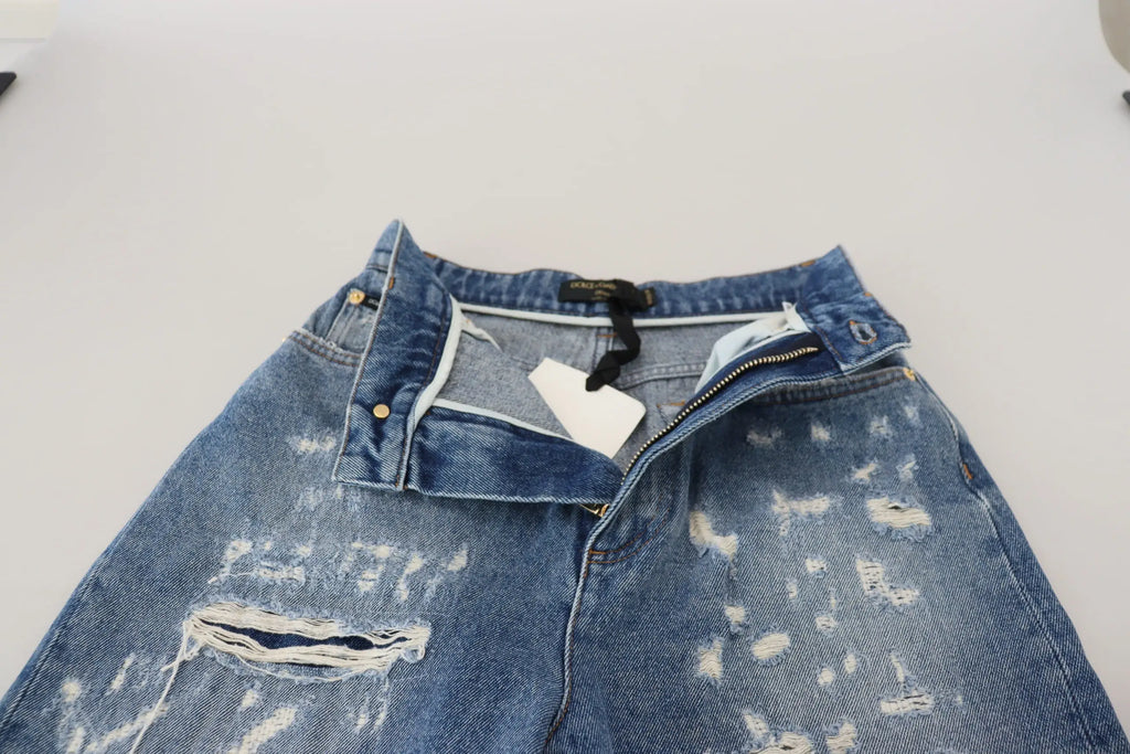 Dolce & Gabbana blue washed cotton tattered denim jeans avec déchirures et effet délavé en jean bleu