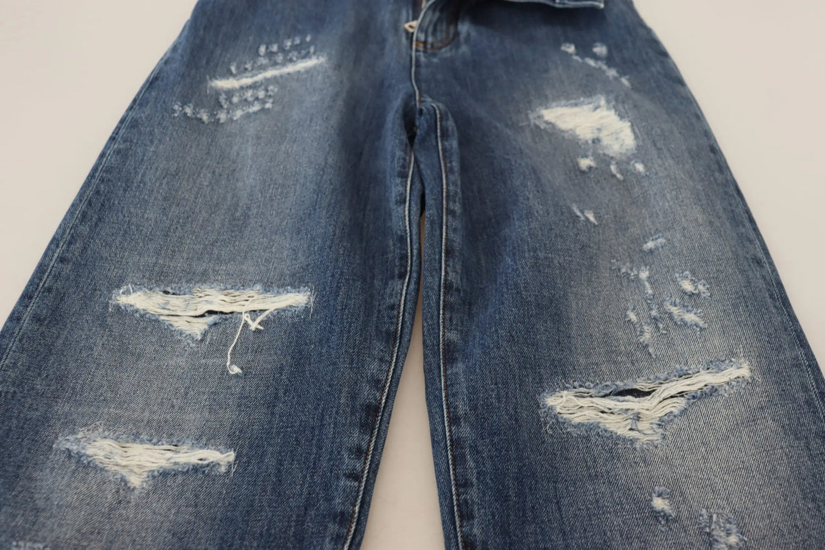 Jean denim délavé bleu dolce gabbana en coton avec déchirures et zones usées visibles sur le devant