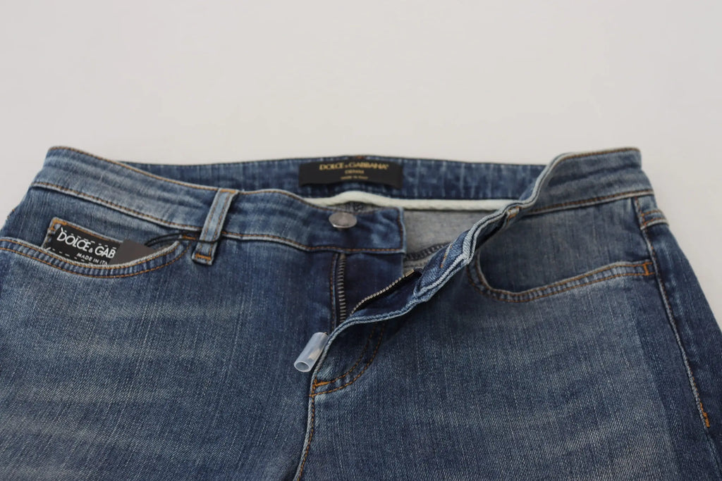 Jeans denim bleu lavé dolce & gabbana en coton avec design classique cinq poches et étiquettes noires