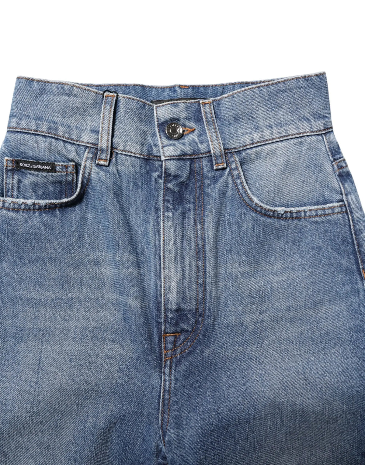Jeans denim skinny bleu lavé dolce gabbana taille haute avec étiquette de marque sur la poche avant