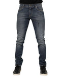 Jean slim bleu denim foncé avec logo plaque dolce & gabbana et délavage subtil sur la cuisse