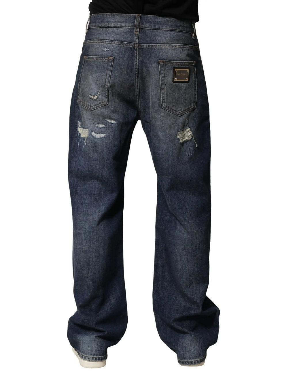 Jeans homme dolce & gabbana en coton bleu foncé avec effet usé et patch en cuir marron rectangulaire vu de dos