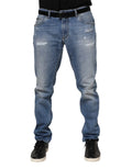 Jean en denim bleu clair délavé dolce & gabbana avec patchs déchirés et ceinture noire