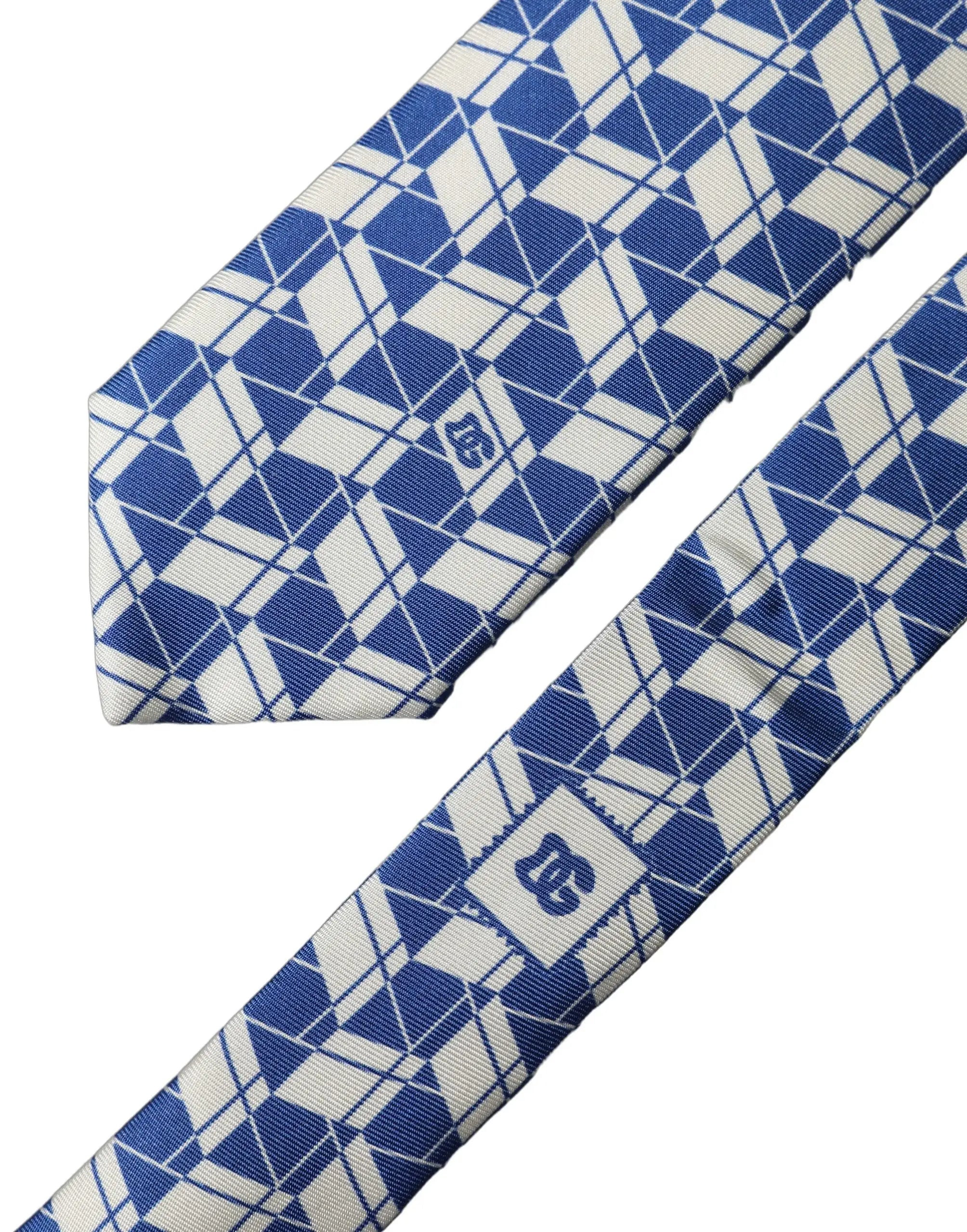 Cravate dolce & gabbana pour homme en soie bleu et blanc avec motif géométrique et texture tissée subtile