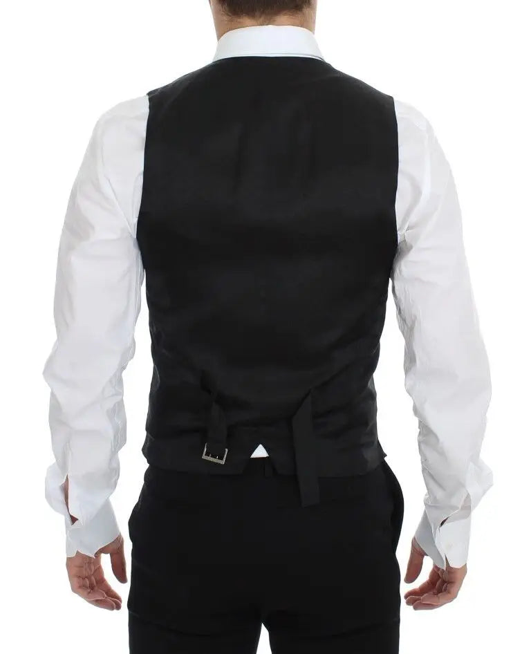 Dos du gilet formel bleu en laine dolce & gabbana avec un ajustement élégant en satin noir et boucle argentée