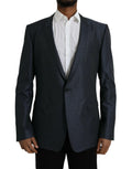 Dolce & Gabbana blazer en laine bleue foncée texturée avec col à revers cranté et deux poches à rabat
