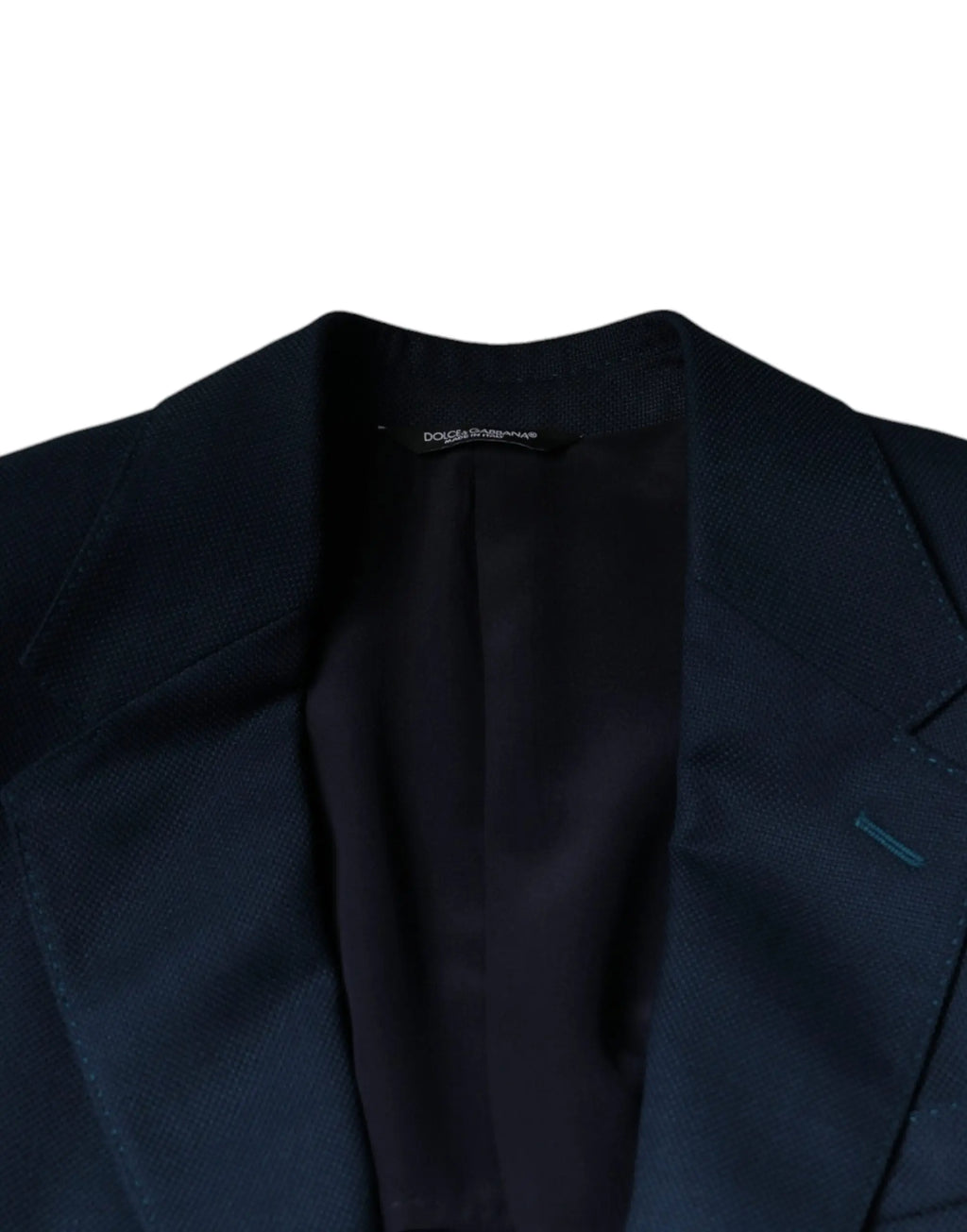 Blazer dolce & gabbana bleu en laine avec tissage texturé subtil et doublure noire étiquette de marque visible
