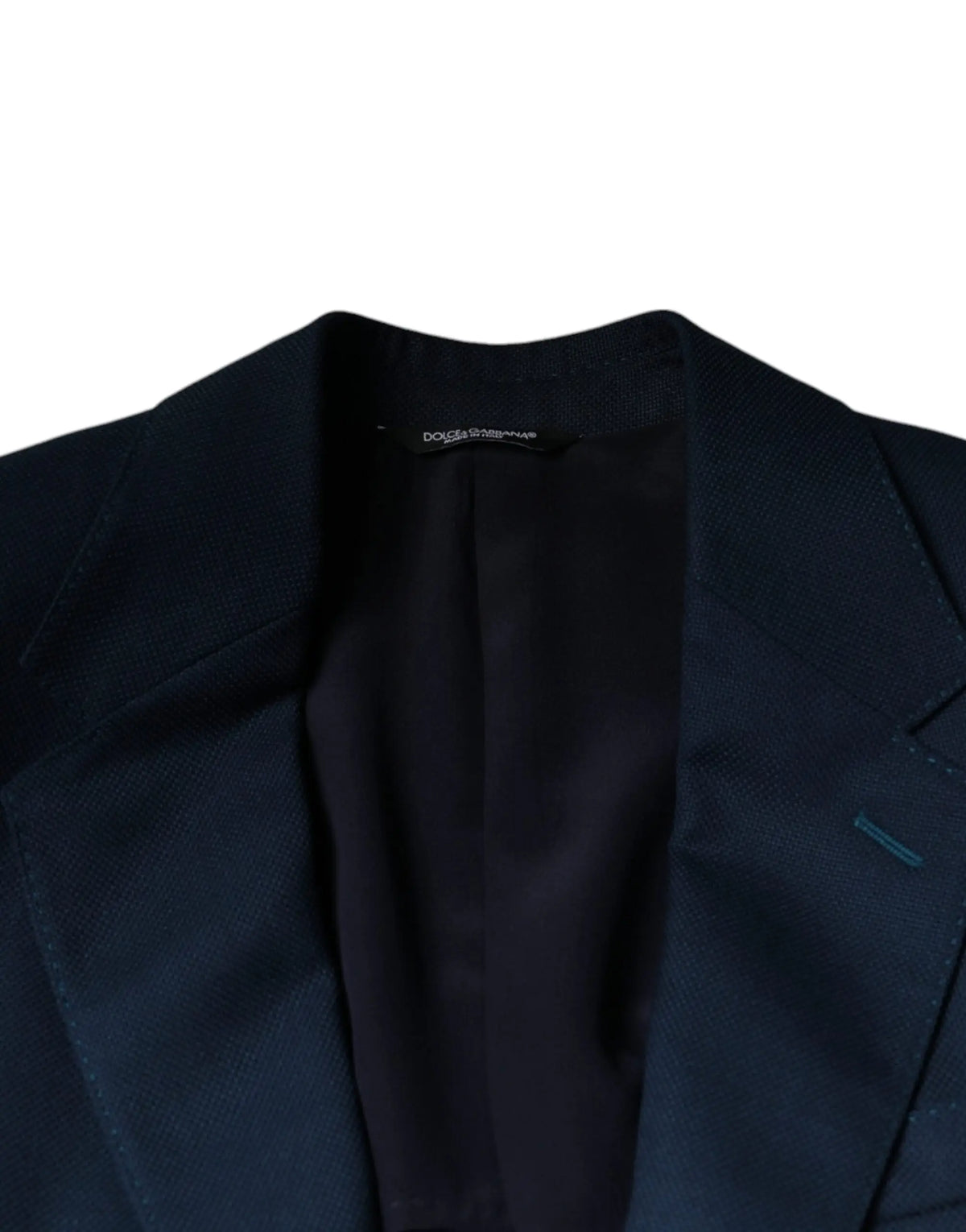 Blazer dolce & gabbana bleu en laine avec tissage texturé subtil et doublure noire étiquette de marque visible