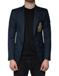 Dolce & gabbana bleu marine blazer en laine tailleur avec écusson doré brodé sur la poche poitrine gauche