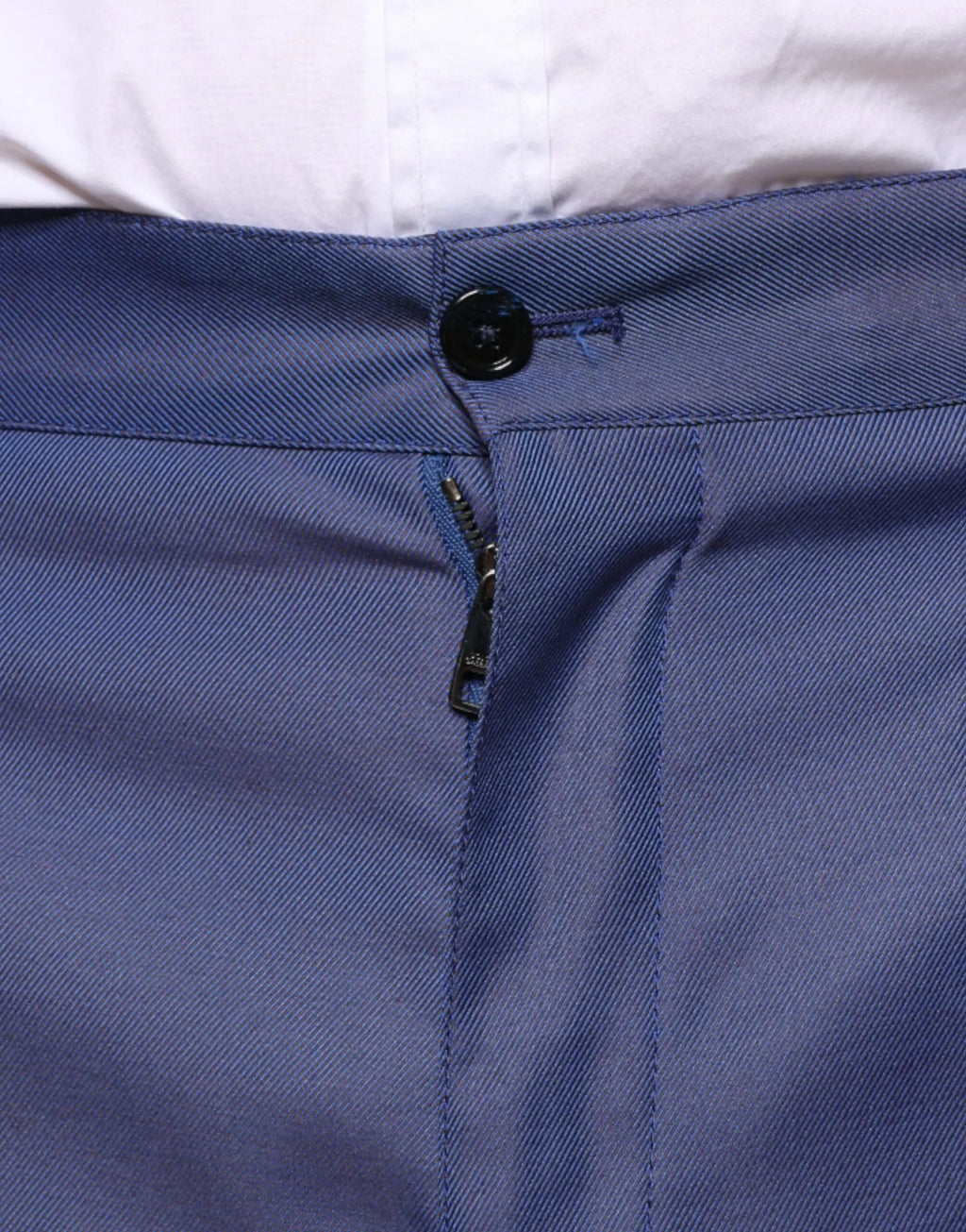 Pantalon habillé bleu en laine dolce & gabbana avec tissu texturé détail bouton noir et fermeture éclair