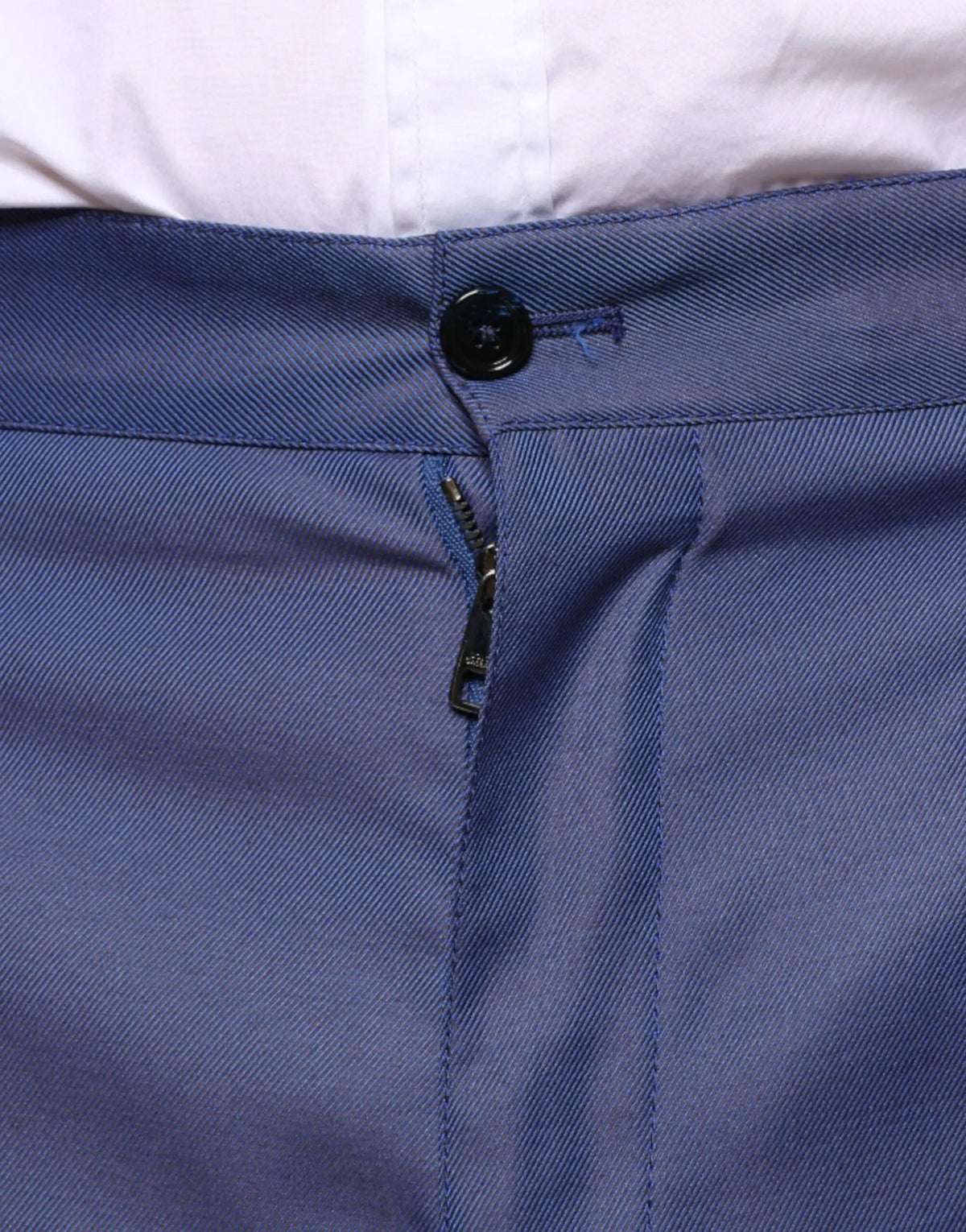 Pantalon habillé bleu en laine dolce & gabbana avec tissu texturé détail bouton noir et fermeture éclair