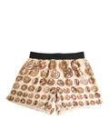 Shorts de bain en soie crème dolce & gabbana avec imprimé pièce ancienne bronze et taille élastique noire