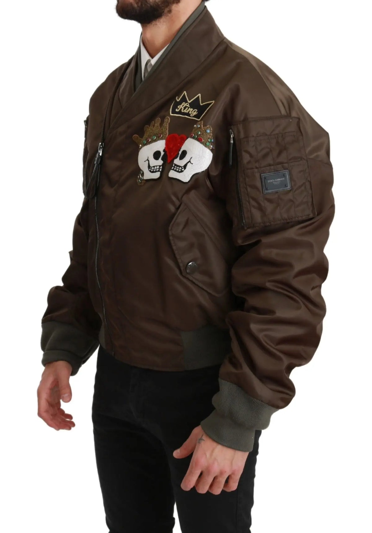 Veste bomber marron dolce gabbana avec patchs brodés de crânes couronnés et bordures vert olive