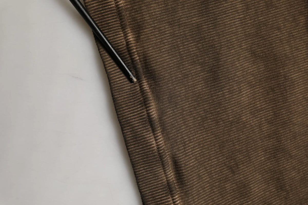 Dolce & gabbana pull henley marron en coton avec bouton et tissu texturé à motif côtelé subtil