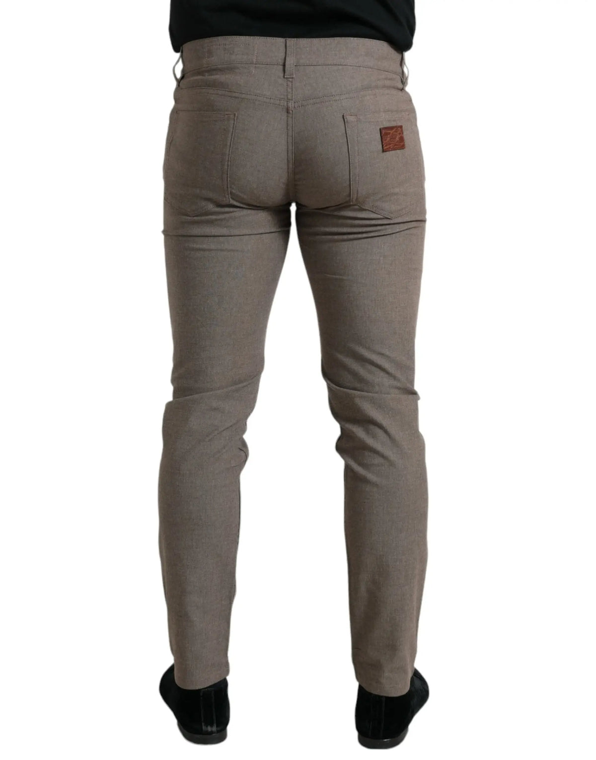 Jeans slim en coton extensible couleur kaki dolce & gabbana vue arrière avec patch en cuir marron sur la poche droite