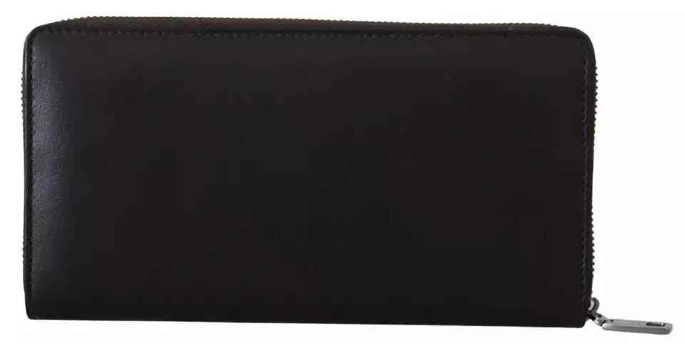 Portefeuille continental zippé dolce & gabbana en cuir noir avec design minimaliste et fermeture éclaire argentée