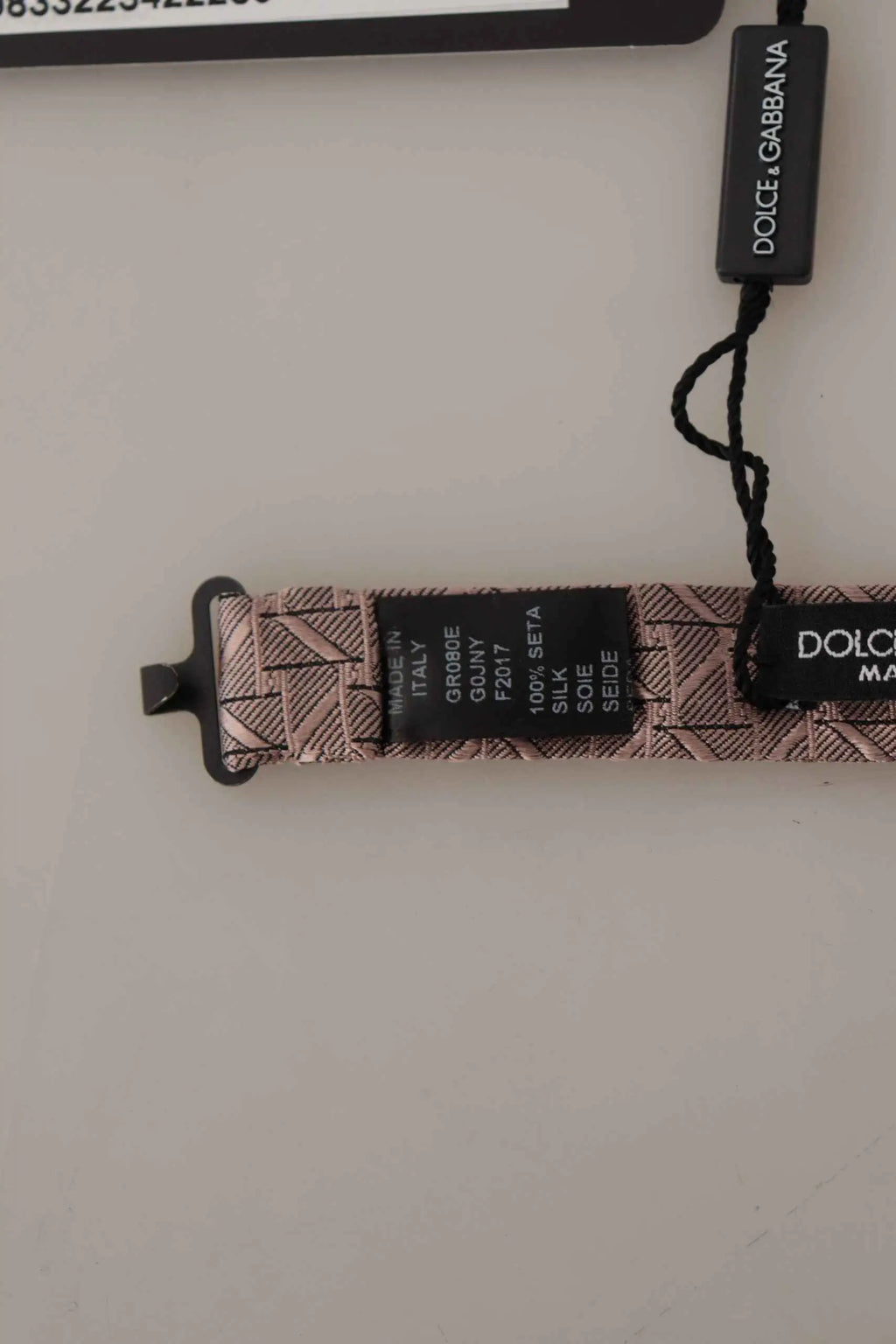 Cravate en soie beige à motif géométrique avec attaches métalliques noires et étiquettes dolce & gabbana
