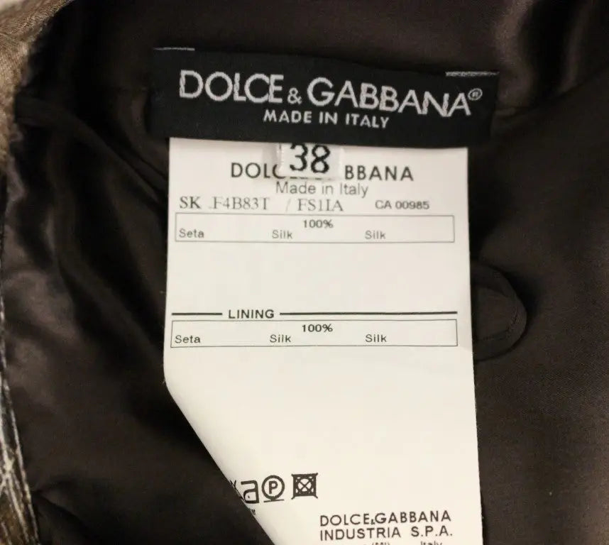 Étiquette noire dolce & gabbana indiquant jupe droite florale marron en soie 100 pour cent fabriquée en italie