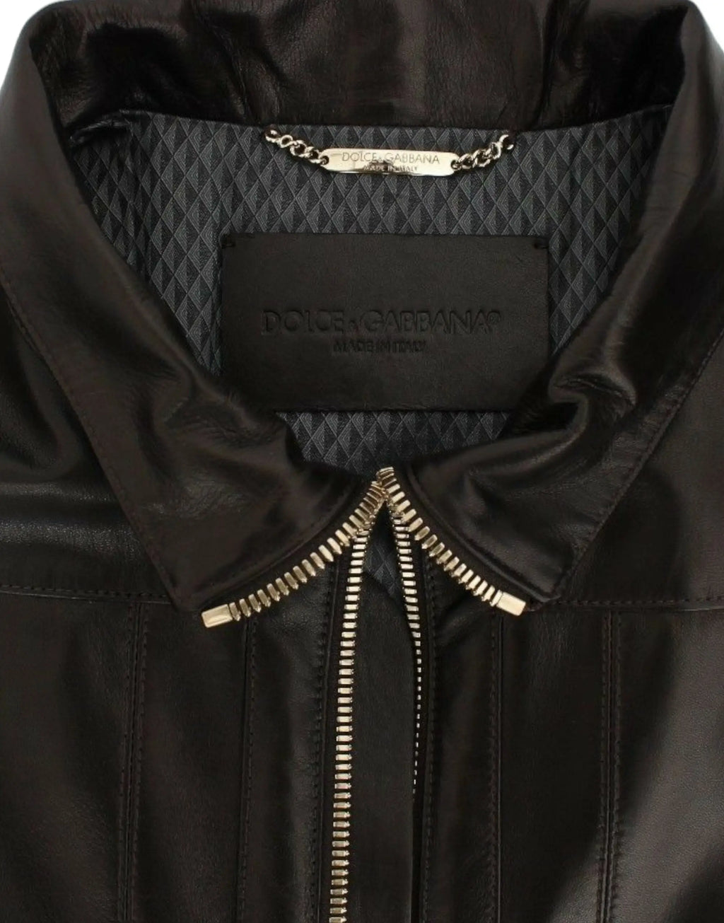Veste en cuir agneau marron dolce gabbana avec fermeture éclair dorée et étiquette chaîne sur cuir noir