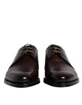 Paire de chaussures derby homme en cuir marron foncé à lacets avec semelles noires dolce gabbana