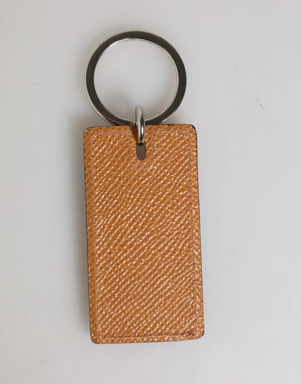 Porte-clés dolce & gabbana en cuir marron avec motif tressé texturé et anneau métallique argenté pour homme