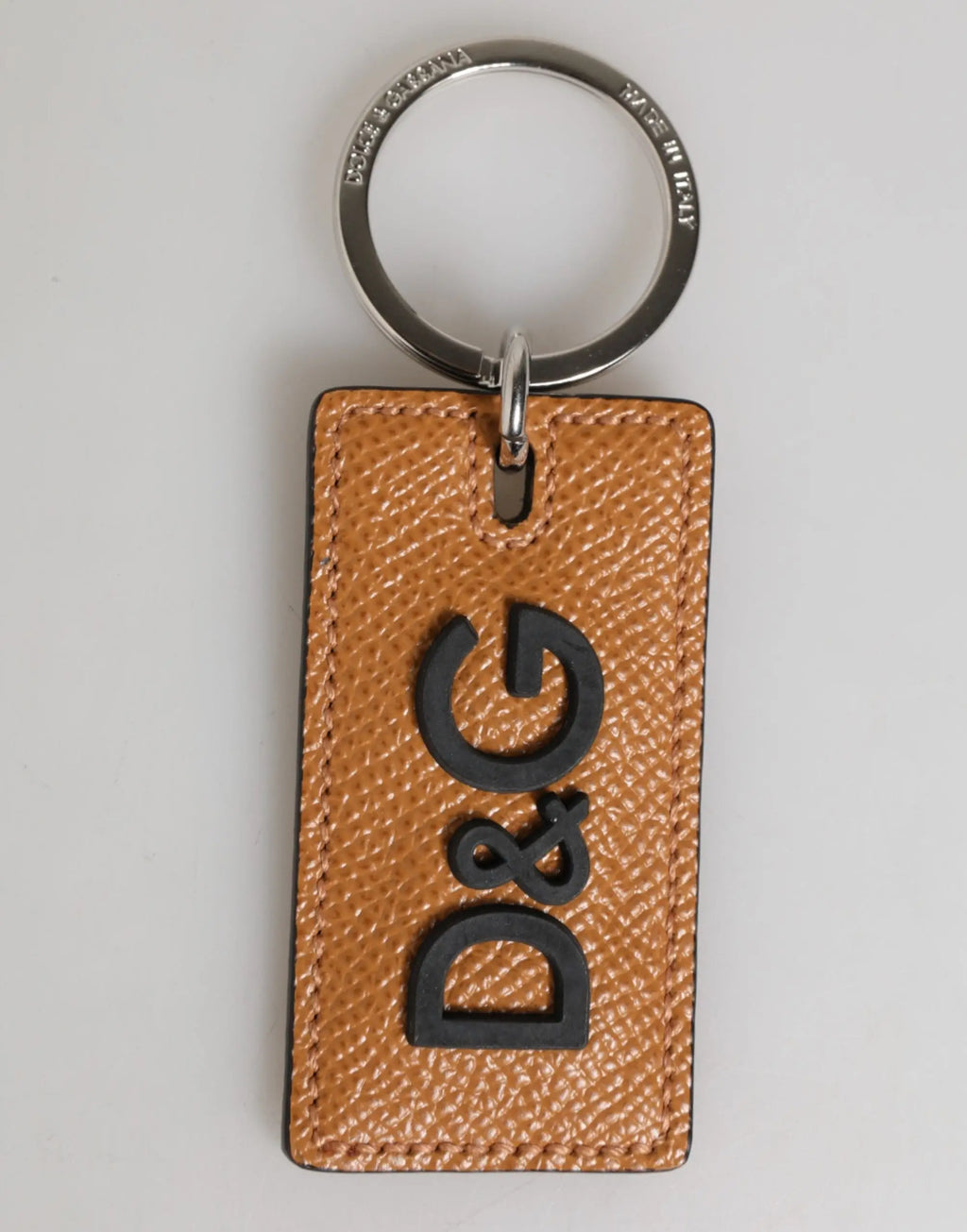 Porte-clés dolce & gabbana en cuir marron avec logo d&g embossé noir et anneau métallique argenté pour homme