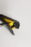 Étui téléphone zippé noir avec doublure intérieure jaune vif pour porte-cartes porte-monnaie dolce gabbana cuir marron