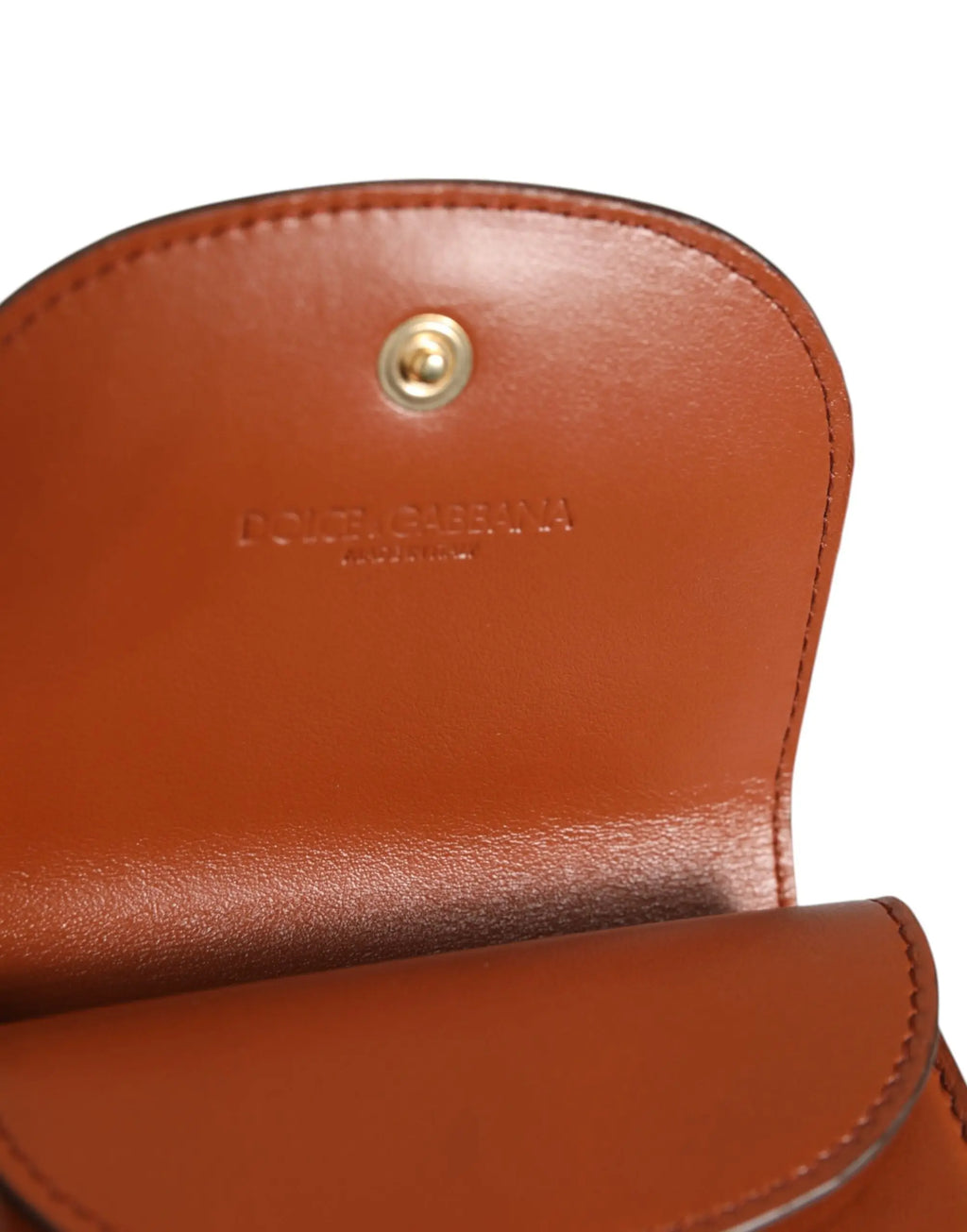 Petit porte-monnaie en cuir de veau imprimé léopard marron dolce & gabbana avec fermeture pression dorée et logo embossé