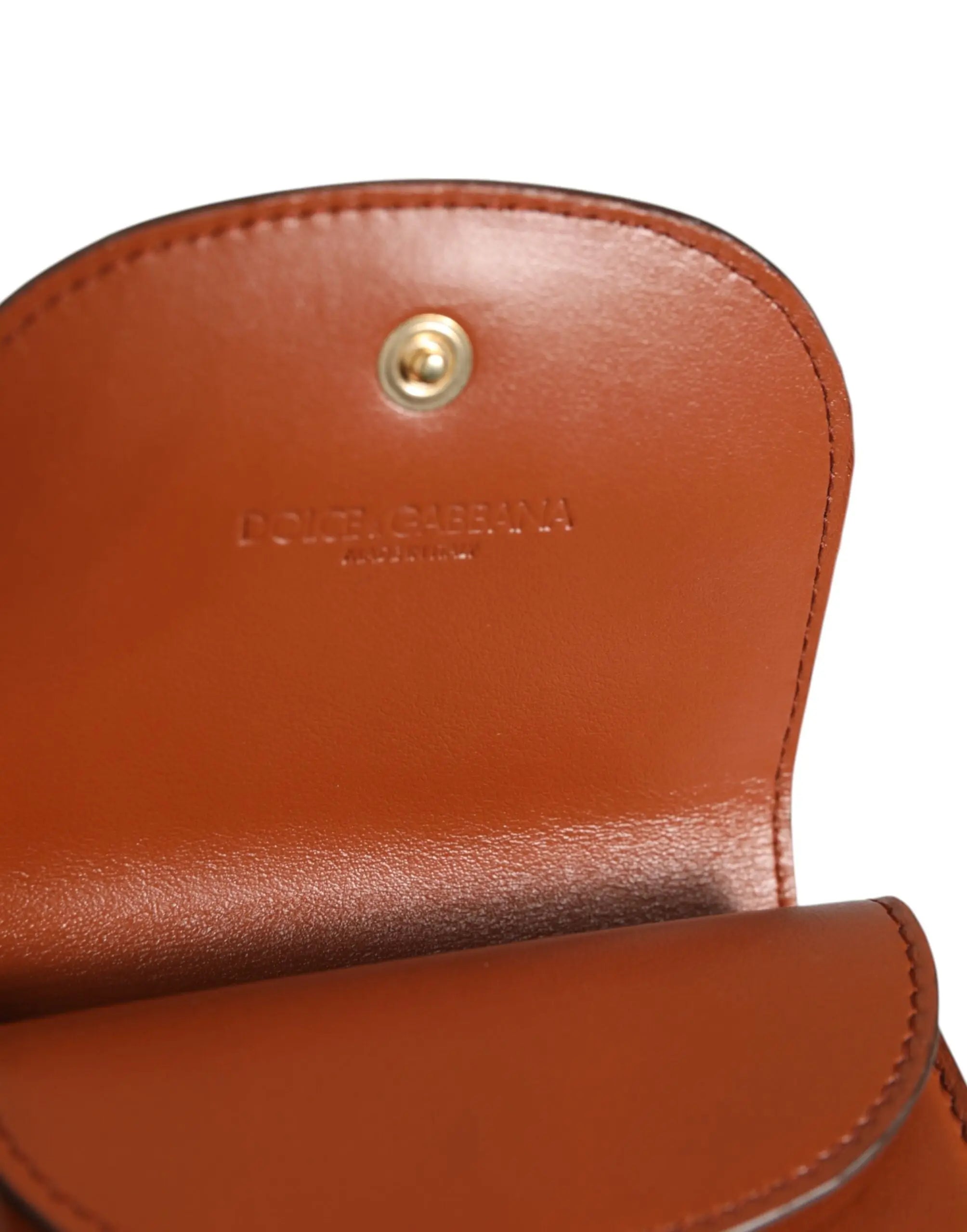 Petit porte-monnaie en cuir de veau imprimé léopard marron dolce & gabbana avec fermeture pression dorée et logo embossé