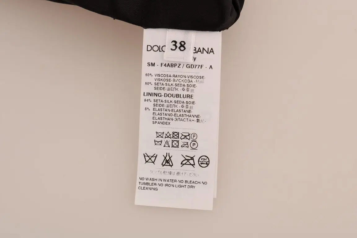 Étiquette de soin blanche avec texte noir dolce gabbana sur jupe en soie marron imprimé léopard a ligne