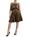 Dolce & gabbana robe marron léopard sans manches à volants avec taille cintrée et jupe évasée en plusieurs couches