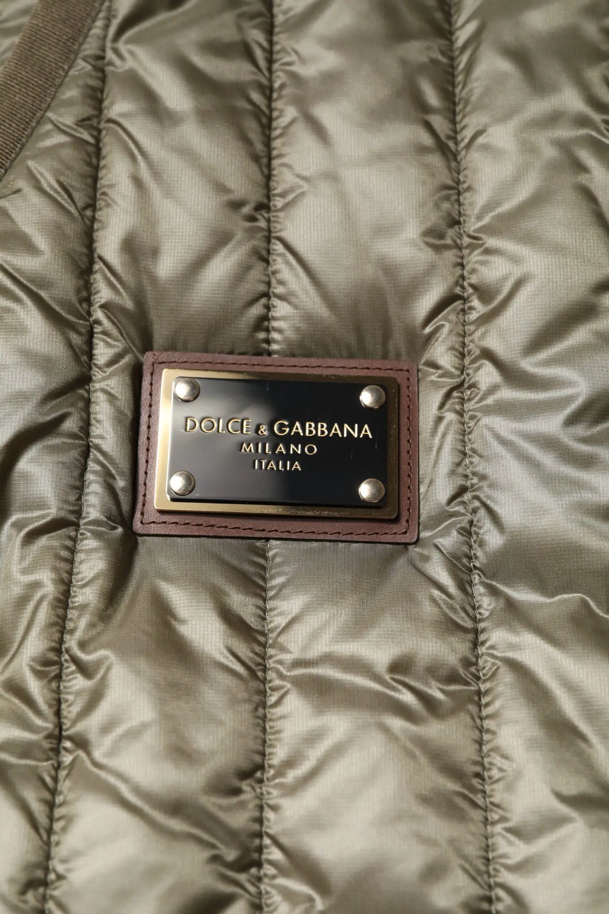 Veste matelassée olive dolce gabbana avec écusson milano italia en cuir marron