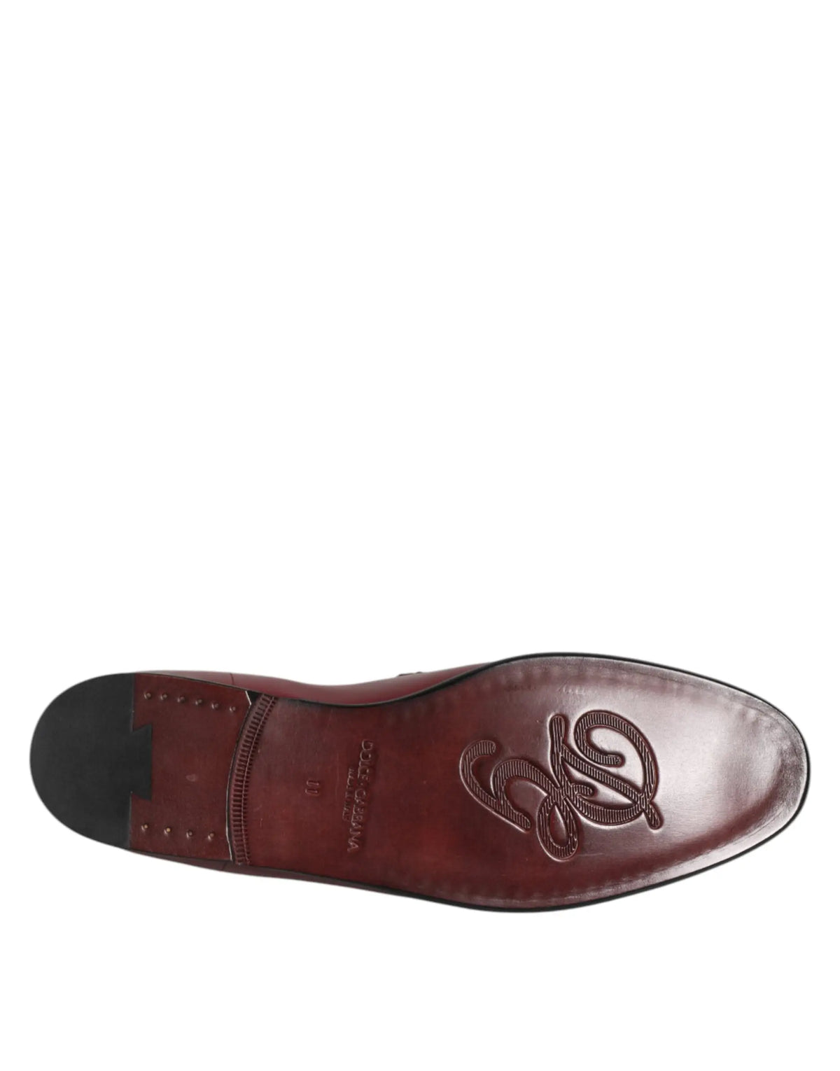 Semelle en cuir marron poli avec logo embossé et couture visible de chaussures formelles dolce & gabbana en cuir de veau bordeaux