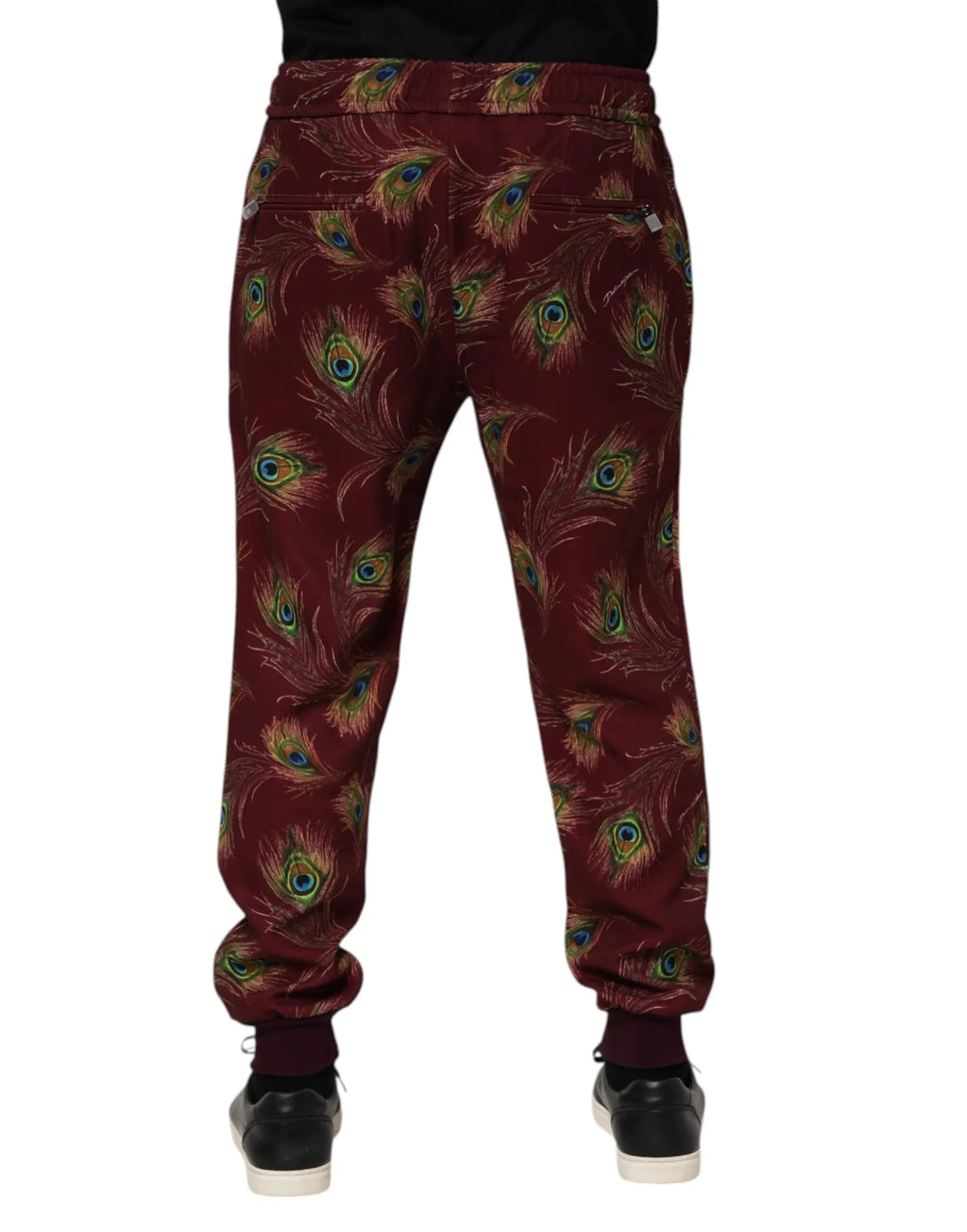 Pantalon jogger dolce & gabbana bordeaux en molleton avec motif plume de paon vert bleu et or vif