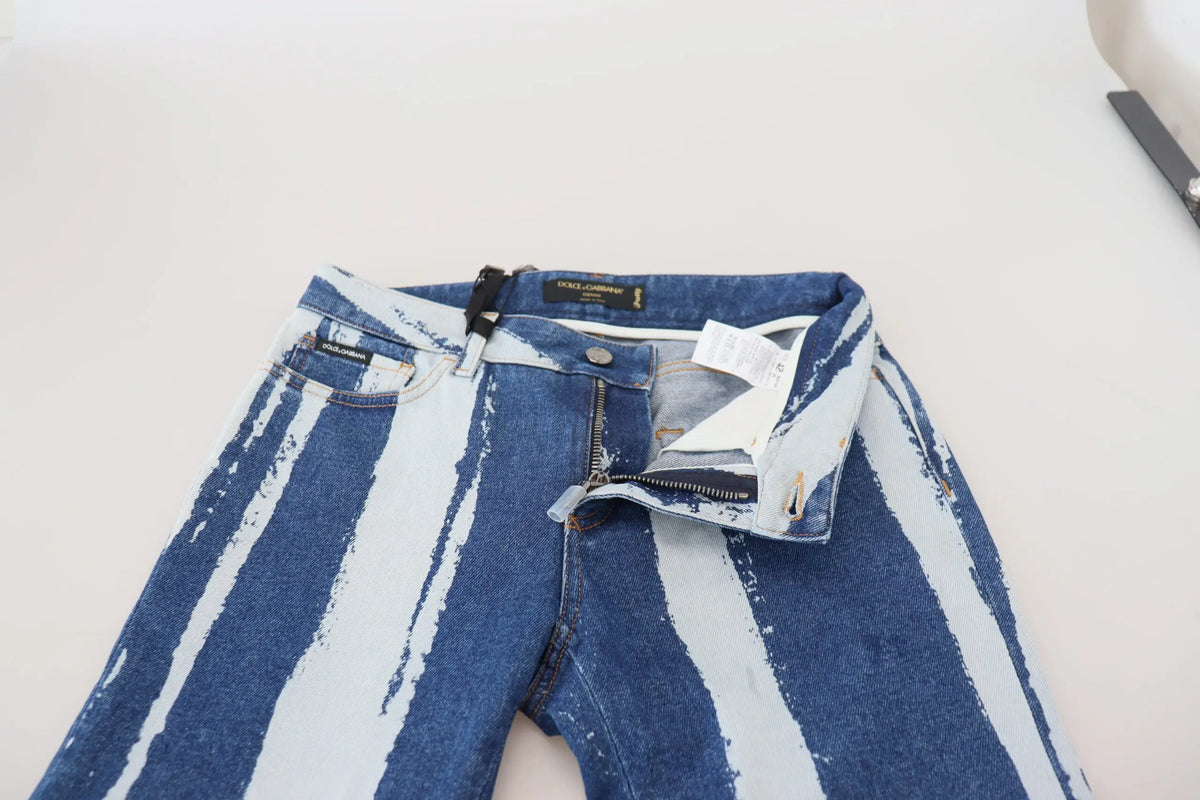 Jeans skinny en denim coton dolce & gabbana avec rayures bleues et blanches, effet délavé et éclaboussures de peinture